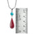 Sterling Silver Pendant With Turquoise Round, Sponge Coral Tear Drop