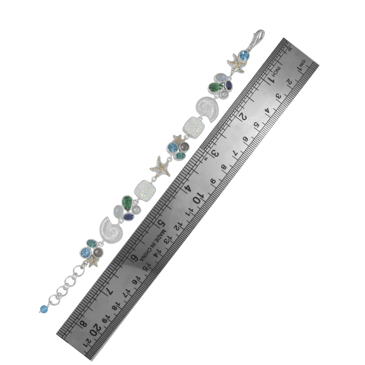 Silver Bracelet With Sea Shell Component And Multi Stone