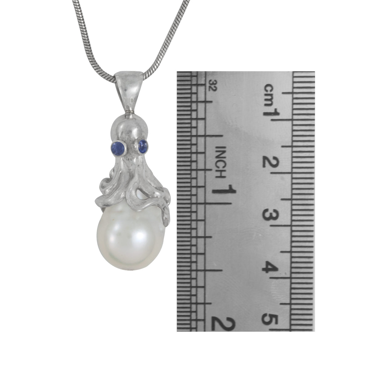 Silver Pendant Octopus With Blue Topaz Round Facet And PEarl Boruge Drop