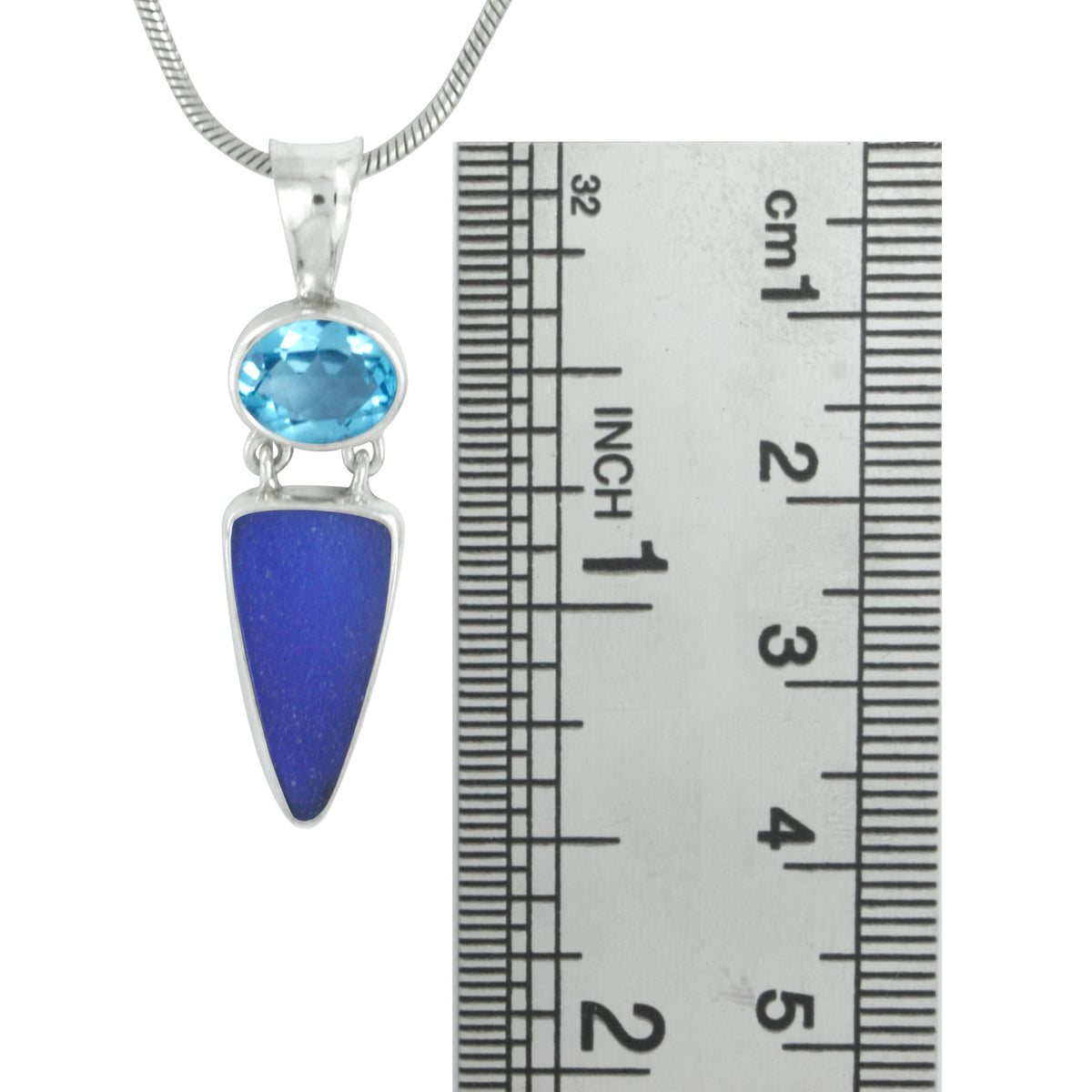 Unique Cobalt Blue Sea glass Pendant with Stunning Blue Topaz