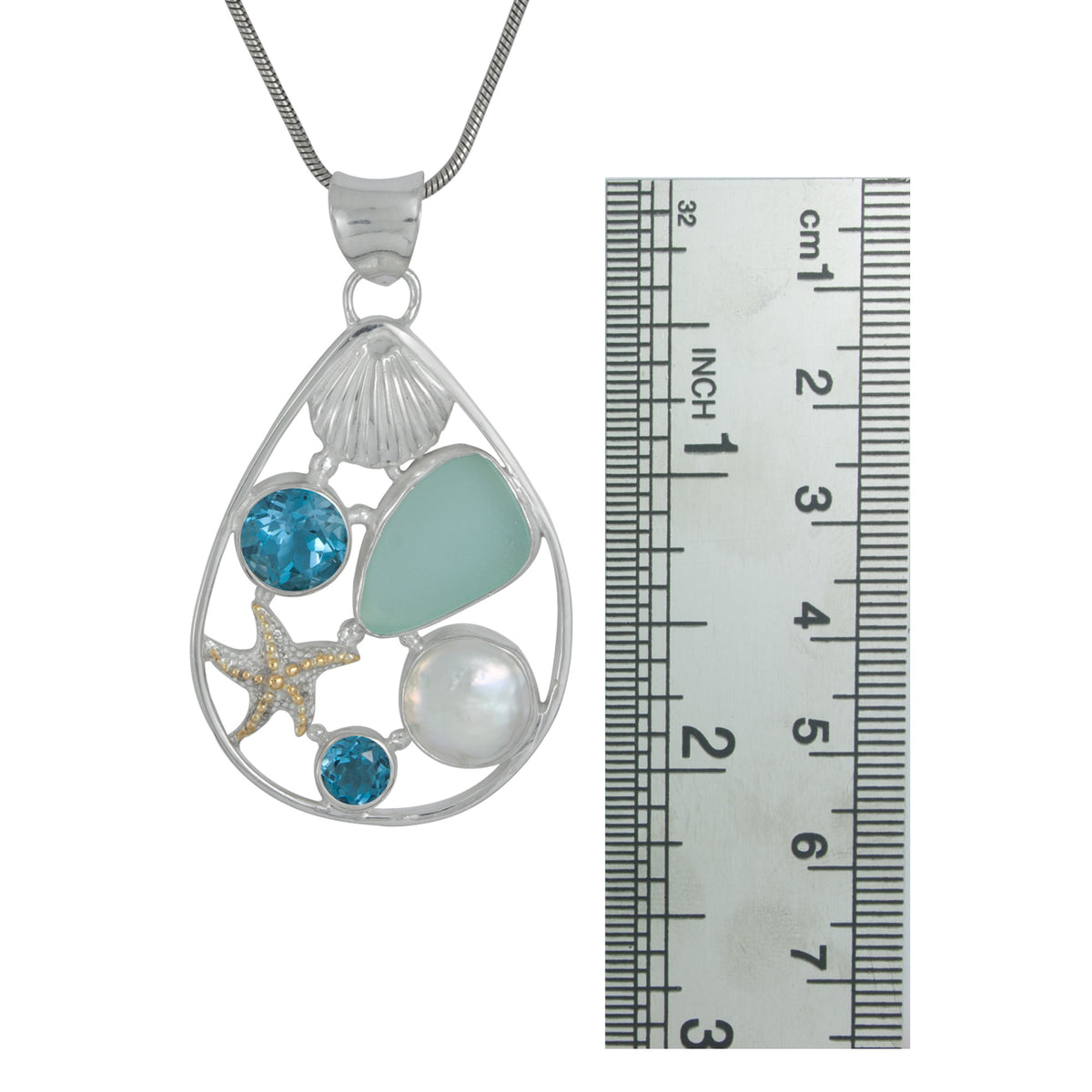 Stunning Sealife pendant with blue Topaz and pearl - truly unique